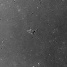 View of Aratus CA and surroundings from Apollo 15. North of the crater is the wrinkle ridge known as Dorsum Owen. Aratus CA AS15-M-0849.jpg