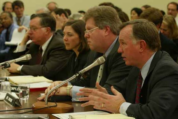 Arthur Andersen employees, from left, Michael C. Odom, Nancy Temple, Dorsey Baskin Jr., and C.E. Andrews are sworn in as they appear before a House Co