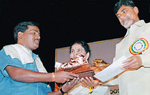 B. Venkateshwarlu (left) receiving Nandi Award from Chief Minister of Andhra Pradesh, Mr. N. Chandrababu Naidu (right). B.Venkateshwarlu receiving Nandi Award.jpg