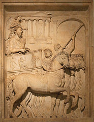 Tuba player (upper right) in a relief in Rome's Palazzo dei Conservatori depicting Marcus Aurelius in triumph