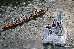 Boats of various sizes carrying and accompanying the statue of Virgin Mary Madonna Fiumarola, Rome, Italy