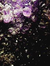 Amethyst mine in Ametista do Sul. South America is a major producer of gems such as amethyst, topaz, emerald, aquamarine and tourmaline. Brasil - Ametista do Sul - Piedra amatista.jpg