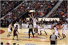 The Gee-Gees against the Ravens in the 2014 Championship game. CIS Basketball Final 2014 opening Tip.JPG