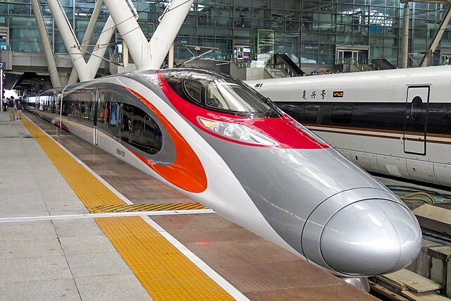 MTR Vibrant Express Train G6581 at Guangzhou South on the inaugural day of operations along the Hong Kong section of the Express Rail Link