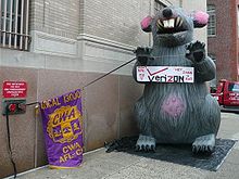 An inflatable rat used by the CWA during a 2009 rally against Verizon CWA union rat protest Verizon.jpg