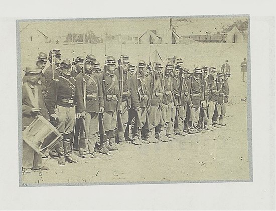 Co C 110th Pennsylvania Infantry after the Battle of Fredericksburg Va. An excellent photograph showing the Union Army white Diamond shaped III Corps Badges on the kepis