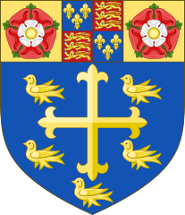 Coat of arms of Westminster Abbey, featuring the Tudor arms between Tudor Roses above the attributed arms of Edward the Confessor