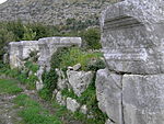 Remaining column plinths of possibly the main/harbour street at Seleucia, where Barnabas and Paul started their journey to Cyprus. Column plinths, Seleucia Pieria.jpg