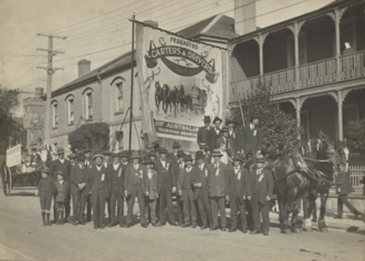 Members of the Tasmanian branch of the Federated Carters and Drivers Union at an Eight-Hour-Day Parade, circa 1920. Federated Carters and Drivers Union.png