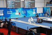 Deutsch: Fechten bei den Olympischen Jugend-Sommerspielen 2018: Tag 1, 7. Oktober 2018, Jungen, Säbel, Viertelfinale - Samuel Jarry (FRA) - Mazen Elaraby (EGY) 14:15 English: Fencing at the 2018 Summer Youth Olympics at 7 October 2018 – Boys' sabre Quarterfinals – Samuel Jarry (FRA) Vs Mazen Elaraby (EGY) 14:15