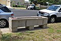 English: en:Bills horse trough on Fitzroy St in en:Geelong. Note the pediment has entirely broken off.