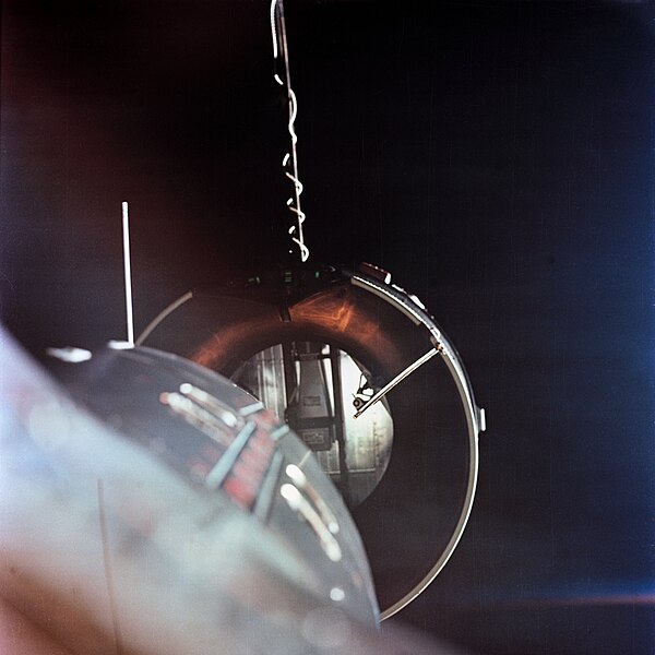 Gemini 8 about to dock with its Agena target vehicle, the first time two spacecraft dock in orbit.