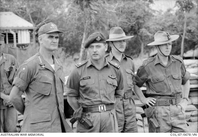 U.S General Westmoreland talks to the commander of the New Zealand artillery battery alongside Australian senior officers in Vietnam, in 1967.