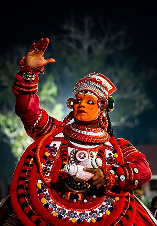 Gulikan Theyyam Vellattam by Shagil Kannur