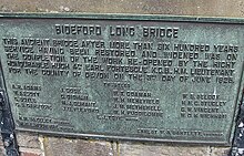 Memorial plaque on Bideford Long Bridge recording the restoration and widening completed in 1925