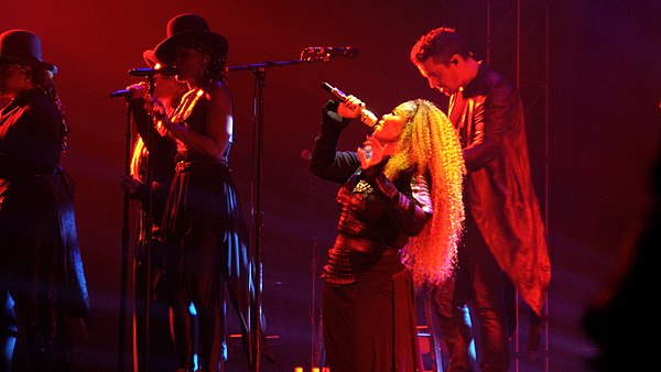 Jackson performing "Got 'til It's Gone" during her Unbreakable World Tour.