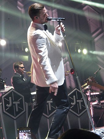 Timberlake performing during The 20/20 Experience World Tour, February 2014. It is Timberlake's highest-grossing tour and one of the highest-grossing tours of the decade
