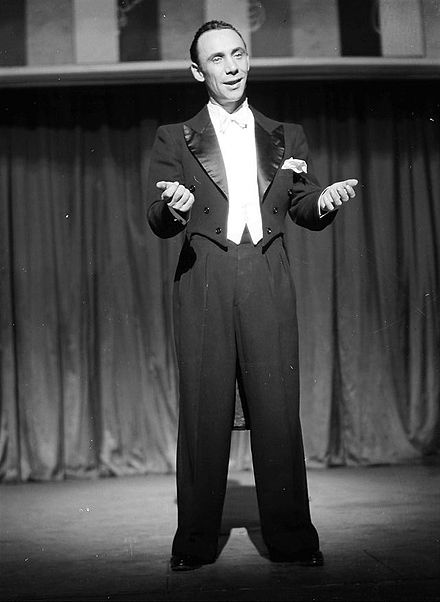 The German actor Rudolf Platte wearing white tie on stage in 1937