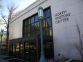 North Visitors' Center exterior with Temple in window reflection