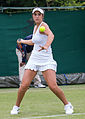 Louisa Chirico competing in the first round of the 2015 Wimbledon Qualifying Tournament at the Bank of England Sports Grounds in Roehampton, England. The winners of three rounds of competition qualify for the main draw of Wimbledon the following week.