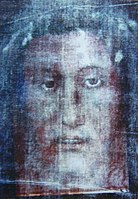 Superposition of the Veil of Manoppello on a negative of the Shroud of Turin