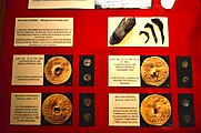 Monedas de contabilidad de bronce llamadas Jettones encontradas en el Sondaje al Pecio