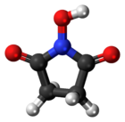 Модел на топка и пръчка на молекулата N-хидроксисукцинимид