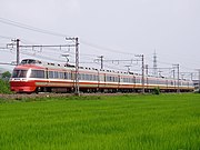 旧塗装に復元された7004×11（2008年8月5日・栢山駅 - 富水駅間）