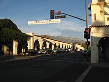 Ojai Arcade, built in 1917 in the Spanish Colonial Revival style. Post Office tower at right.