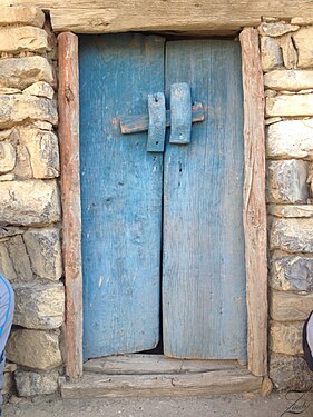 Old blue door at Taferdoust village in Skoura, Morocco