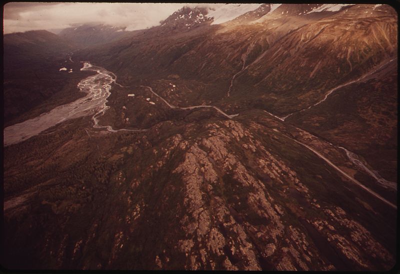 File:PTARMIGAN DROP. VIEW LOOKS EAST DOWN THE TSINA RIVER VALLEY HERE, THE ROUTE WILL BRING THE LINE TOWARD THE CAMERA, IT... - NARA - 550633.jpg