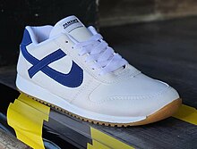 A white and blue pair of Panam 0319 sneakers Panam 0319.jpg