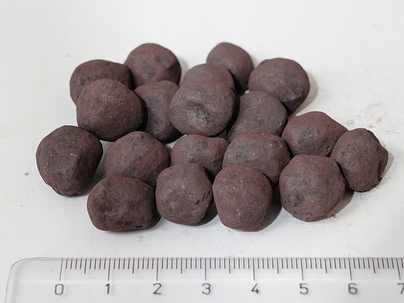 File:Pelletized iron ore with scale.jpg