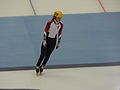 Petra Jászapáti debout sur la glace, au repos.