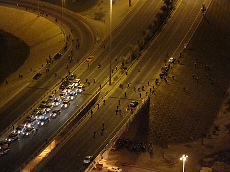Police moving to Pearl Roundabout from the northern side.jpg