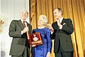 President George H. W. Bush and Mrs. Barbara Bush present the Medal of Arts to John Updike at the White House.jpg