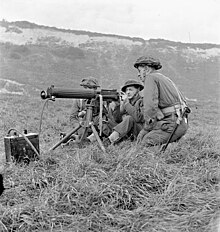 Soldiers of Princess Patricia’s Canadian Light Infantry firing a Vickers machine gun during a training exercise, Eastbourne, England, 3 December 1942