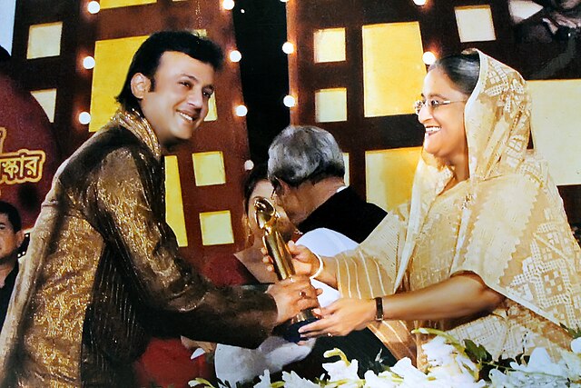 Riaz Receiving National Award 2008 from Prime minister Sheikh Hasina in 2010.