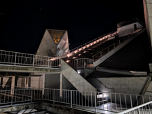 The top of Cesar Chavez Student Center at night Roof of Cesar Chavez Student Center, Oct30, 2023.png