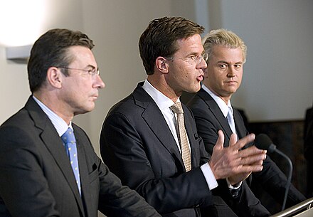 Rutte presenting his first cabinet together with Deputy Prime Minister Maxime Verhagen (CDA) and coalition partner Geert Wilders (PVV)