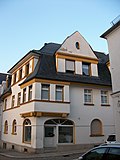 Residential house in a corner and semi-open development