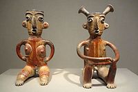 Earthenware and pigment female and male figurines, 2nd century AD