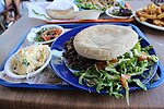 Thumbnail for File:Shwarma, mainly as lunch. Shwarma is small slices of chicken, lamb, or beef, served with pita bread, salad, hummus, tahini sauce, pickles, and chips.jpg