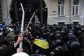 Riot police (Bekrut), defending the Kiev city council building, and protesters clash at Bankova str, Kiev, Ukraine. December 1, 2013.