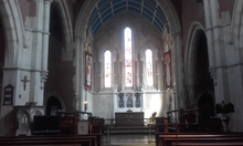 The interior of the chancel at St Andrew's, intended as a memorial to the philanthropist William Cotton. St Andrew Leytonstone chancel.png