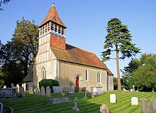 The Barn Church's broach spire is copied from the spire at this church near Winchester in Hampshire - St Swithun's Church, Martyr Worthy. St Swithun, Martyr Worthy - geograph.org.uk - 963812.jpg