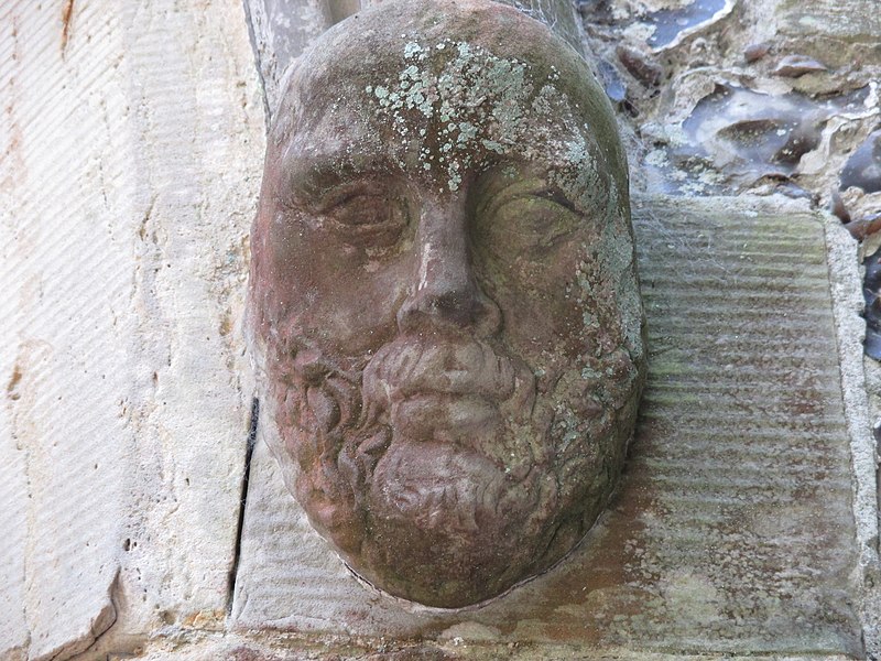 File:Stanmer Church stone head.JPG