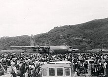 A C-130 Hercules at Long Tieng, May 1975. U.S. Air Force Lockheed C-130A Hercules at Long Tieng, Laos, May 1975 (230102-F-IO108-002).JPG