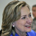 U.S. Secretary of State Hillary Rodham Clinton, left, greets Service members after her speech at Andersen Air Force Base, Guam 101029-N-QE566-002 (cropped).jpg