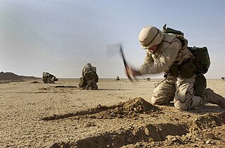 File:US Navy 030209-N-5319A-005 Seabees of Naval Mobile Construction  Battalion Seventy-Four (NMCB-74) have only ten minutes to dig.jpg -  Wikipedia